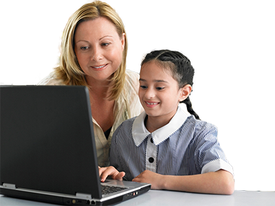 A schoolgirl with her mother using a computer