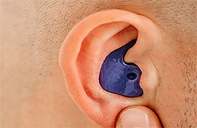 Ear with an ear plug. 