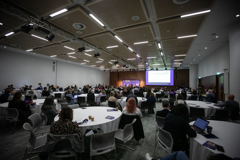 Wide shot of people attending NEON Forum 2023