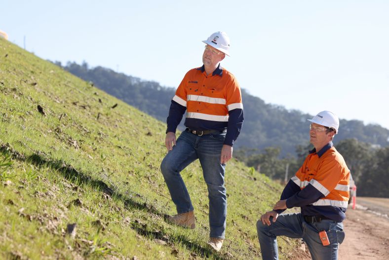 2 Coffs Harbour Bypass workers standing together