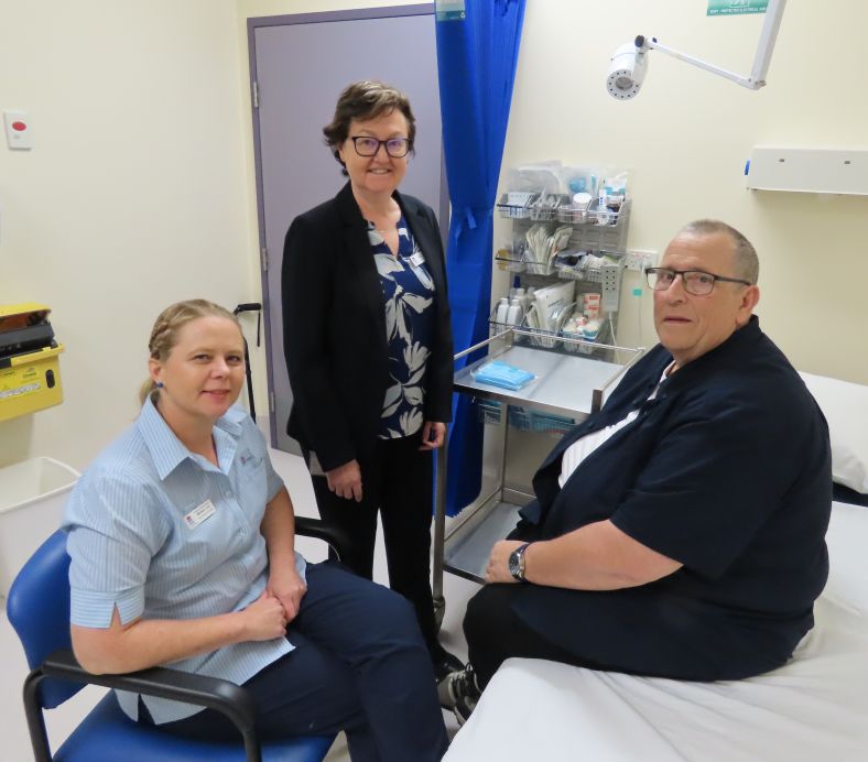 Megan Jordan (sitting) with Wendy Gleeson (FWLHD Executive Director Nursing and Midwifery, Director Clinical Governance) with former wound clinic patient Mr William Maher.