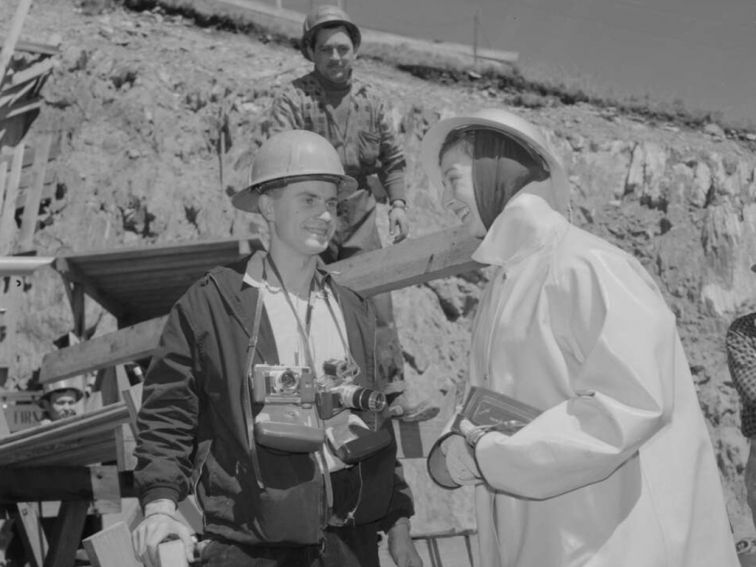 Black and white photo of The Queen visits the Geehi Tunnel under construction at the Snowy Mountains Hydro-Electric Scheme, 1963