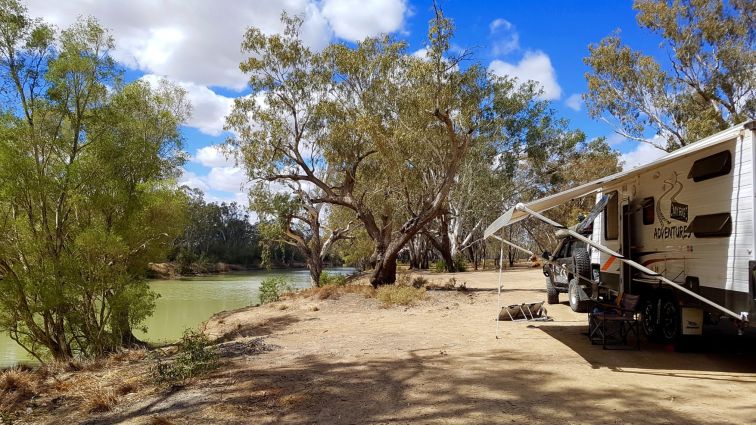 caravan parked at the edge of the Barwon river