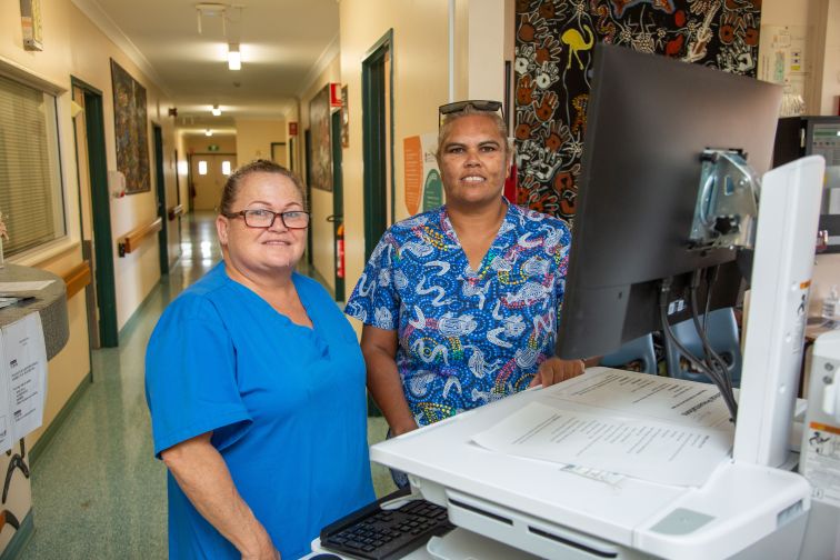 Nursing staff at Goodooga reviewing patient notes