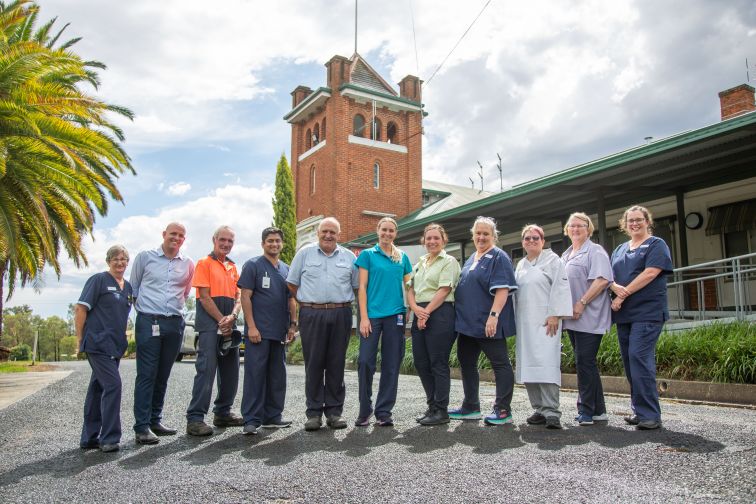 Healthcare workers from Canowindra gather at the front of the hospital