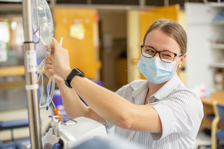 Nurse with drip bag