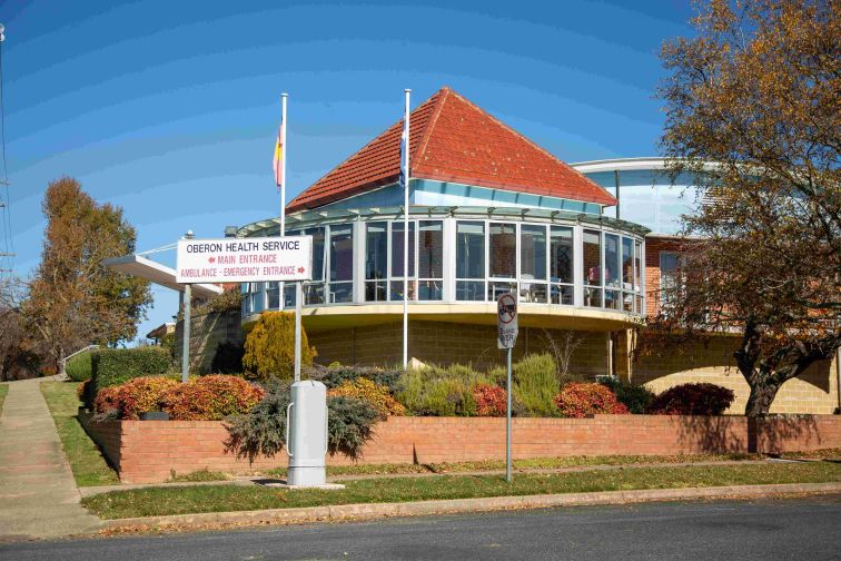 Looking at the front of Oberon hospital in to the glass windows