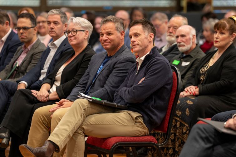 New South Wales Premier Chris Minns, independent Member for Orange Phil Donato and Cabinet ministers sit in the audience at Orange Community Cabinet.