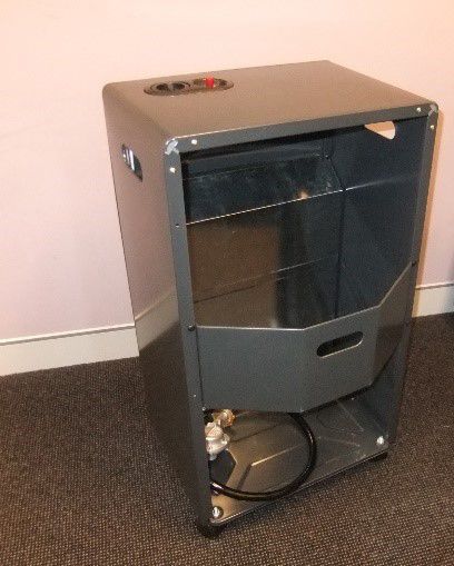 A gas heater by a wall