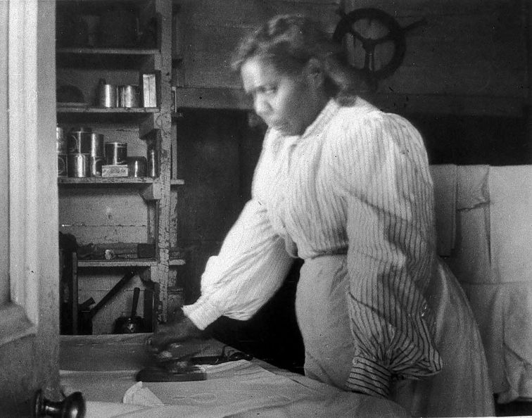 Aboriginal maid ironing at ‘Kaleno’ station – Bourke, NSW