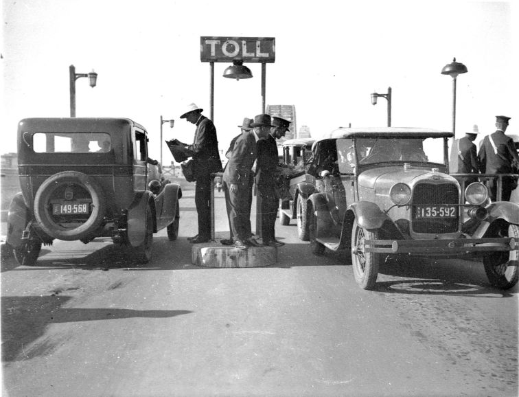 The first motorists to cross the newly opened Sydney Harbour Bridge, 1932.