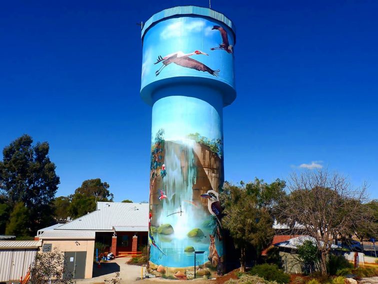 Lockhart Water Tower Mural by Scott Nagy & Krimsone