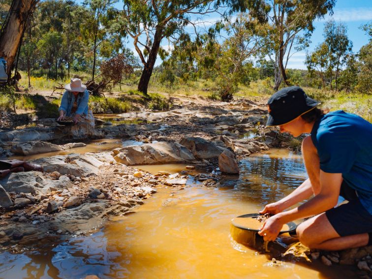 Boy Panning for gold in the Tambaroora Commons.