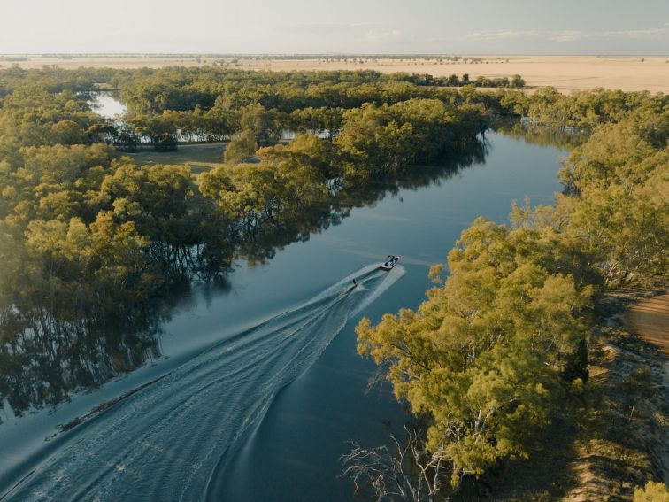 Aerial view of the Urana Aquatic Centre with a ski boat and  kayak