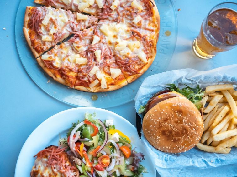 image containig pizza, hamburger and salad