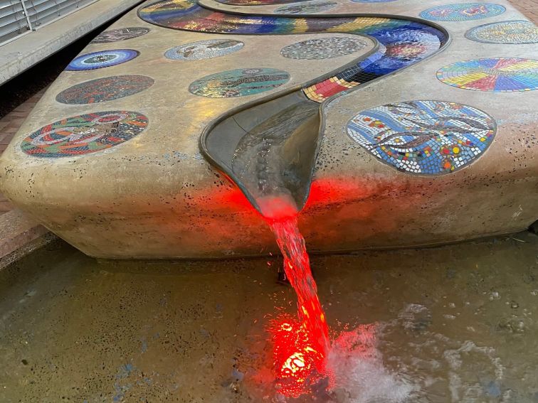 Fountain lit up at night