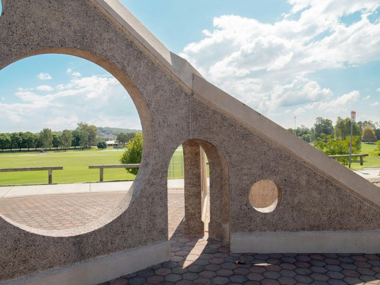 Singleton Sundial, showcasing architectural elements with views through to Rose Point Park.