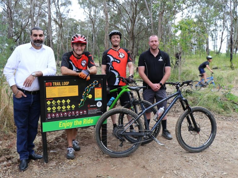 Mountain bikers and Campbelltown Mayor at the opening of the Ingleburn Mountain Bike Trail