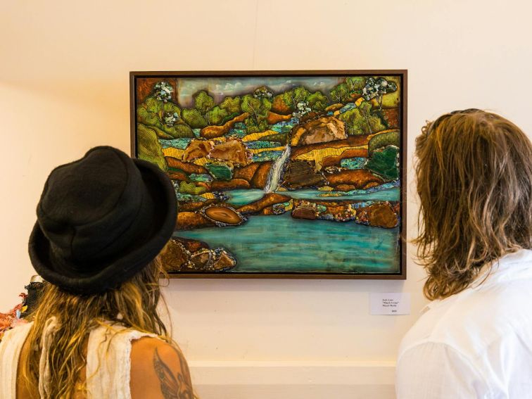 Couple admiring the beautiful artwork