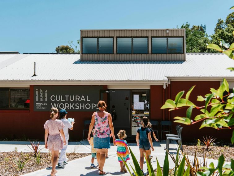 Visitors walking towards the Mudgee Arts Precinct Cultural Workshops