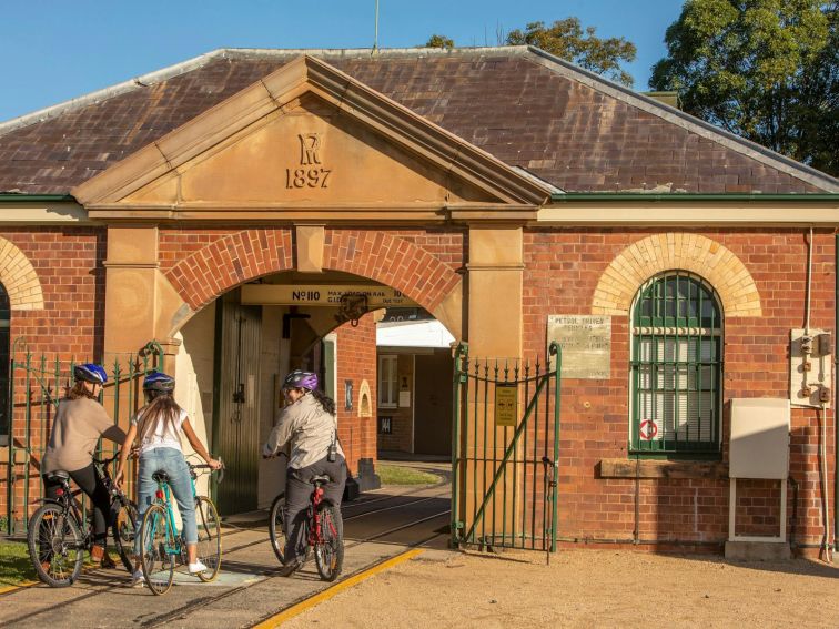 Bike riders at Newington Armory with Park RangerS