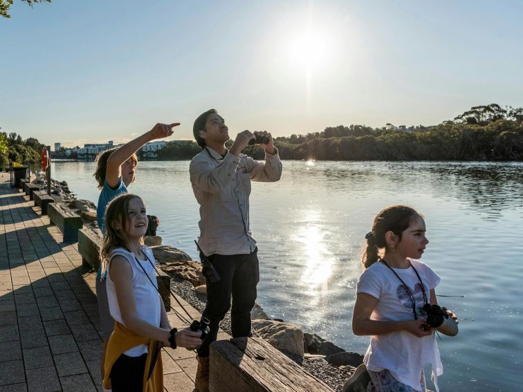 Park Ranger and visitor children at Armory Wharf bird watching