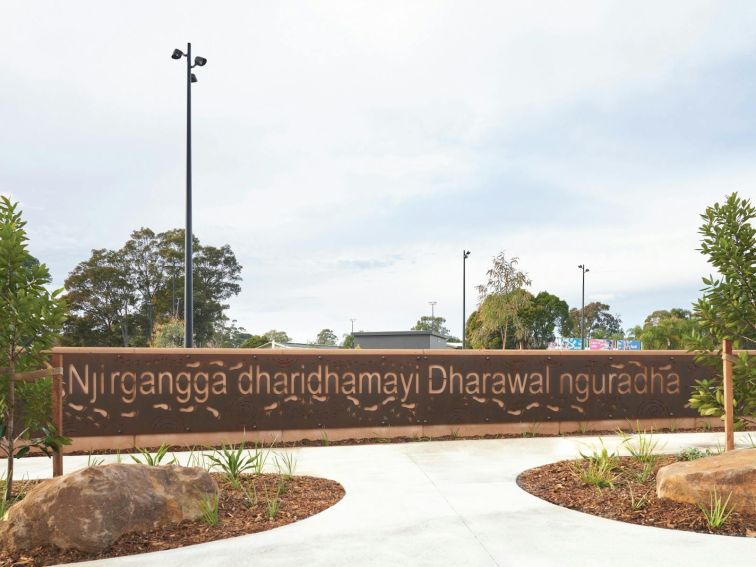 You are standing on Dharawal country written in Dharawal on a wall.