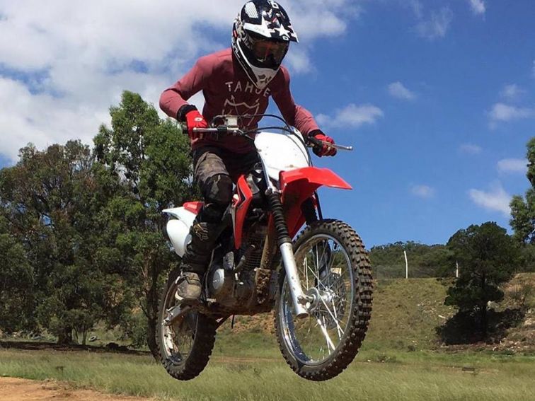 Motorcycle rider taking a jump