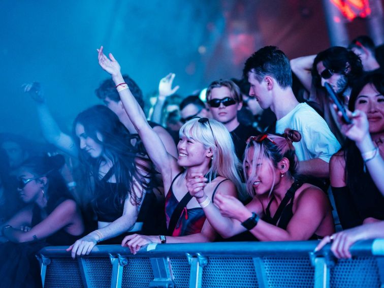 Photo of girls smiling in crowd at X Club, Vivid, Carriageworks 2024