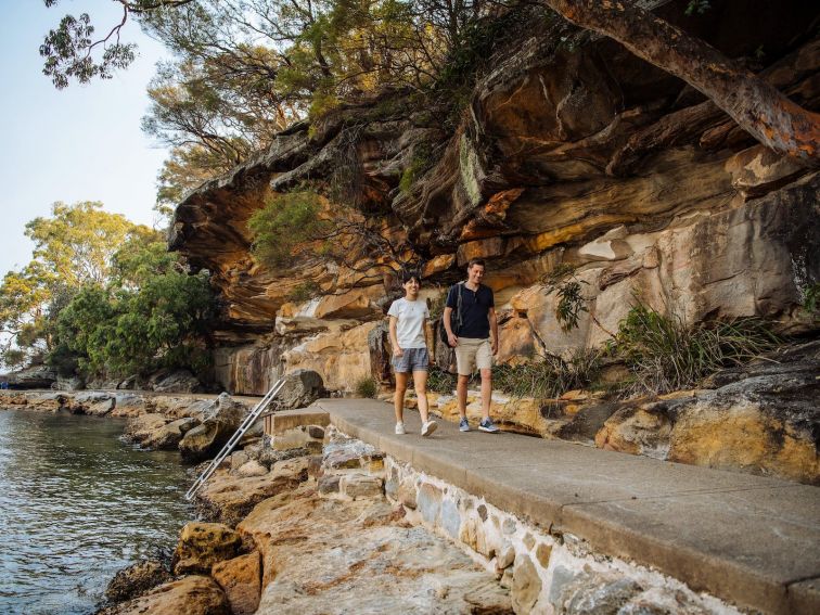 Couple enjoying a scenic walk around Parsley Bay, Vaucluse