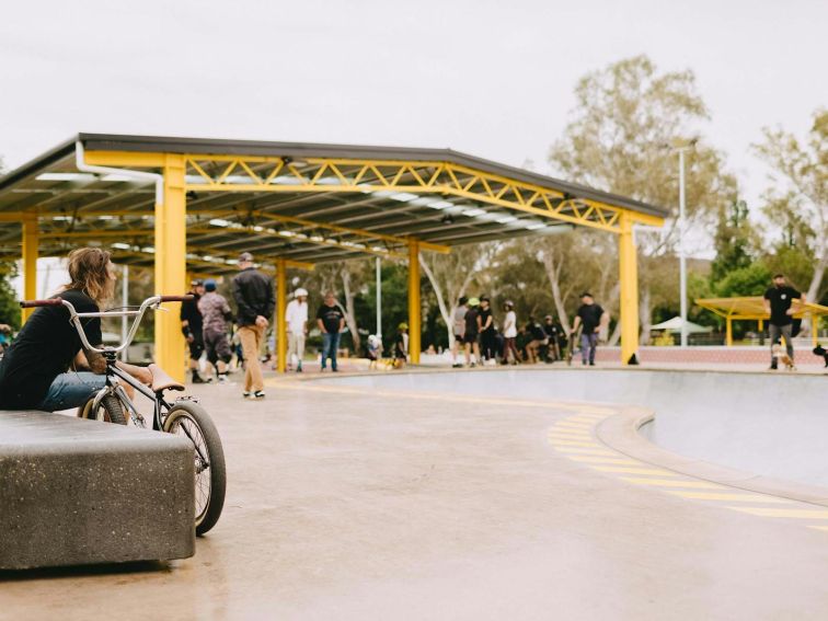 View of  lots of people under the shelter at the Albury Skate Park