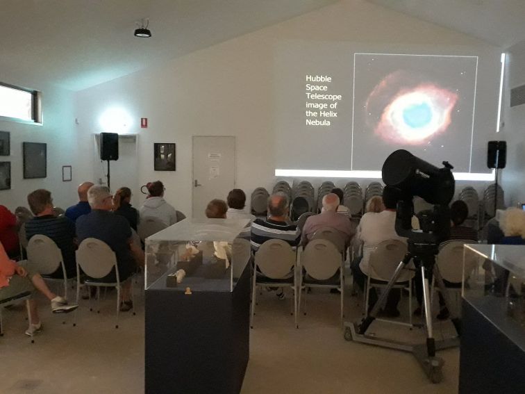 Photo of audience attending the talk session at our regular presentation & viewing night.