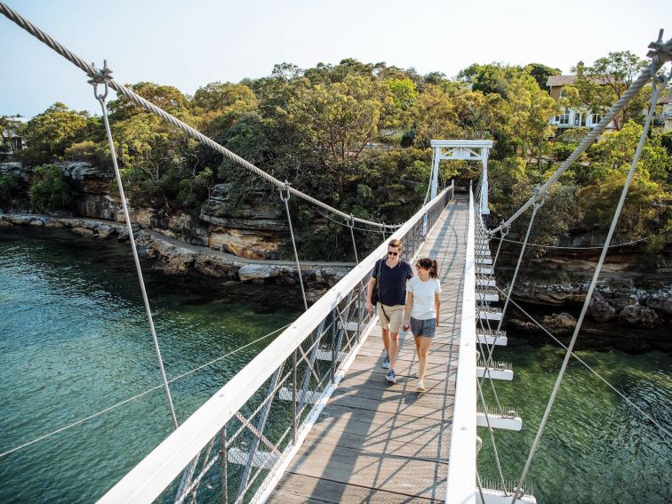 Couple enjoying a scenic walk around Parsley Bay, Vaucluse