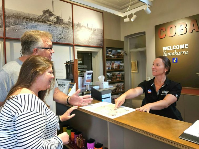 Friendly staff assisting visitors