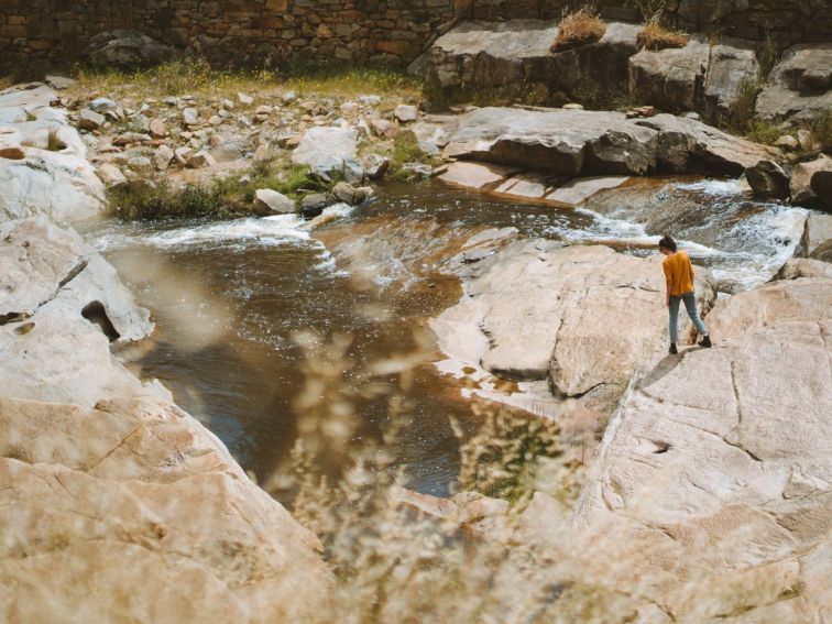 Person wandering Adelong Falls Gold Mill Ruins, Adelong, Snowy Valleys, NSW