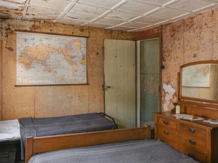 Historic bedroom with two single beds