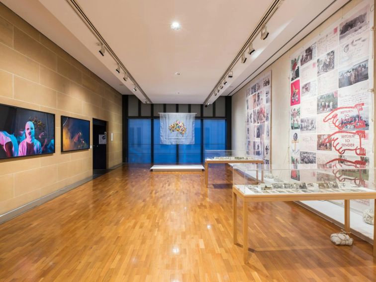 Museum hallway with exhibit