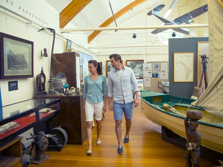 Couple viewing the historic artifacts major collection on a visit to the Lord Howe Island Museum