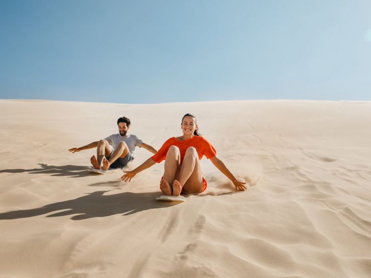 Sandboarding on Stockton Beach