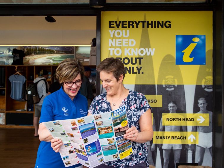 serving customers at Manly Visitor Information Centre