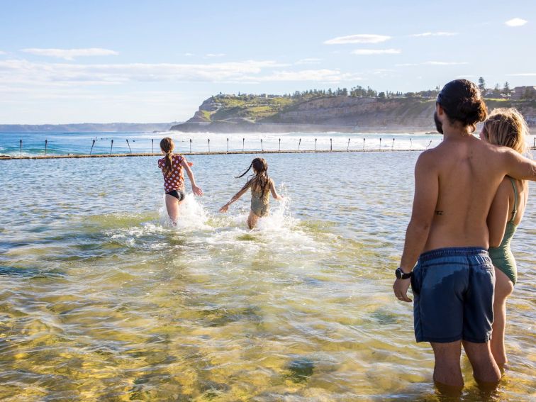 Family enjoying a day out at the Canoe Pool, Newcastle