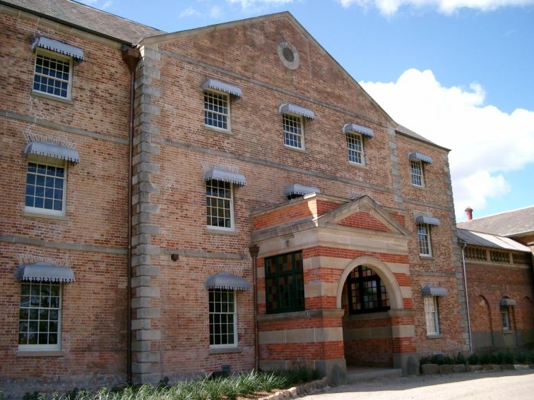 Side front view of Female Orphan School building