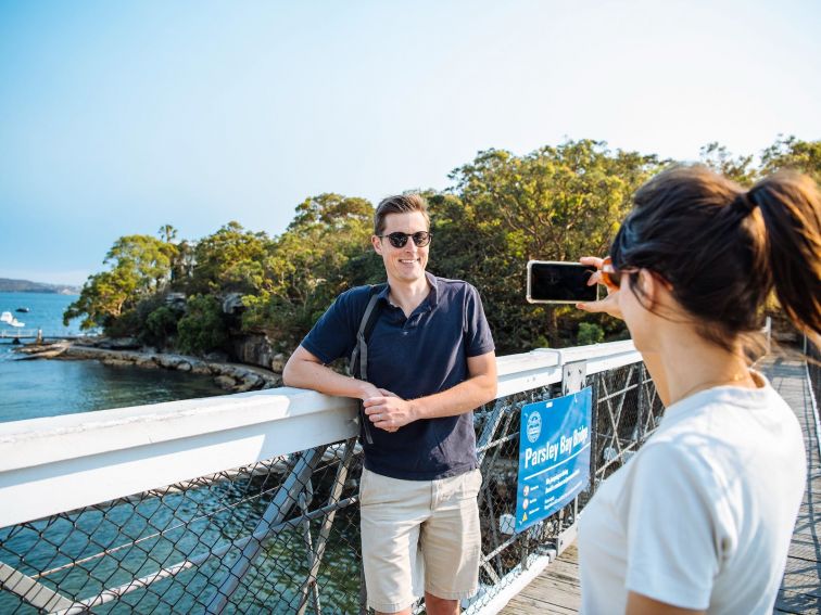 Couple enjoying a scenic walk around Parsley Bay, Vaucluse