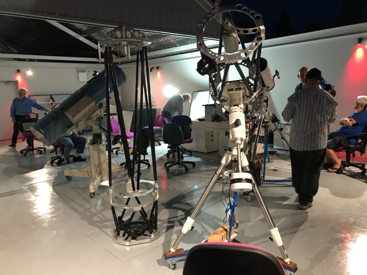 Photo of Club members & telescopes set up for club viewing night in large roll-off-roof observatory