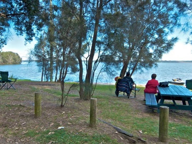 People in Elizabeth Bay picnic area, Munmorah State Conservation Area. Photo: John Spencer