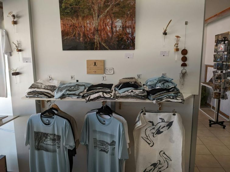 Tea shirts, tea towels and other artworks on display