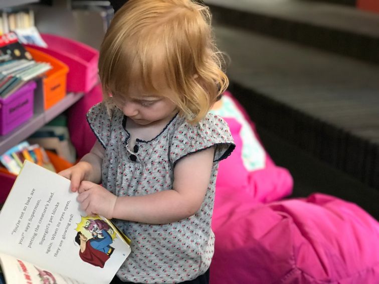 Young reader choosing a book