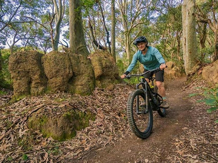 Mountain biker in Glenrock State Conservation Area. Photo: John Spencer &copy; DPE