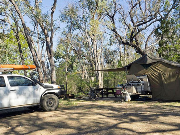 A tent with ute parked next to it in Horton Falls campground and picnic area, Horton Falls National