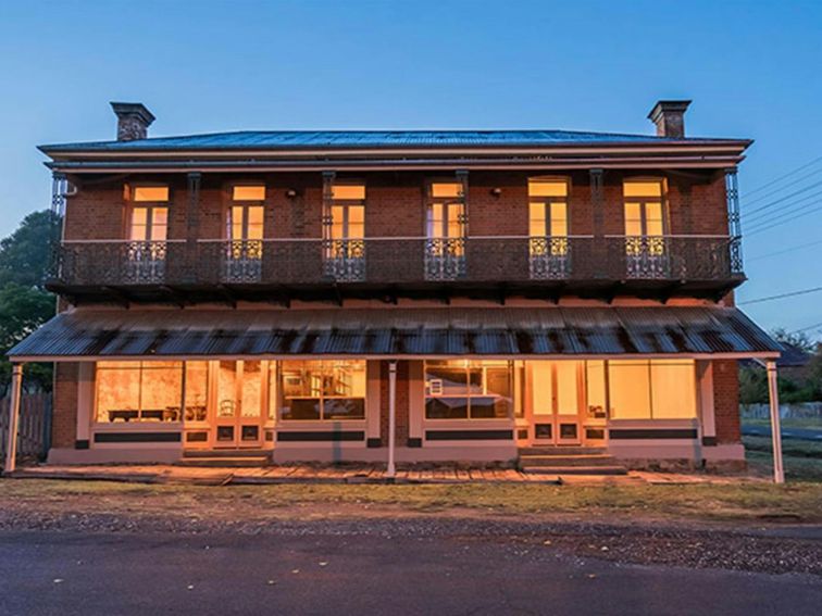 Exterior of Hosies accommodation at night, Hill End Historic Site. Photo: J Spencer/OEH